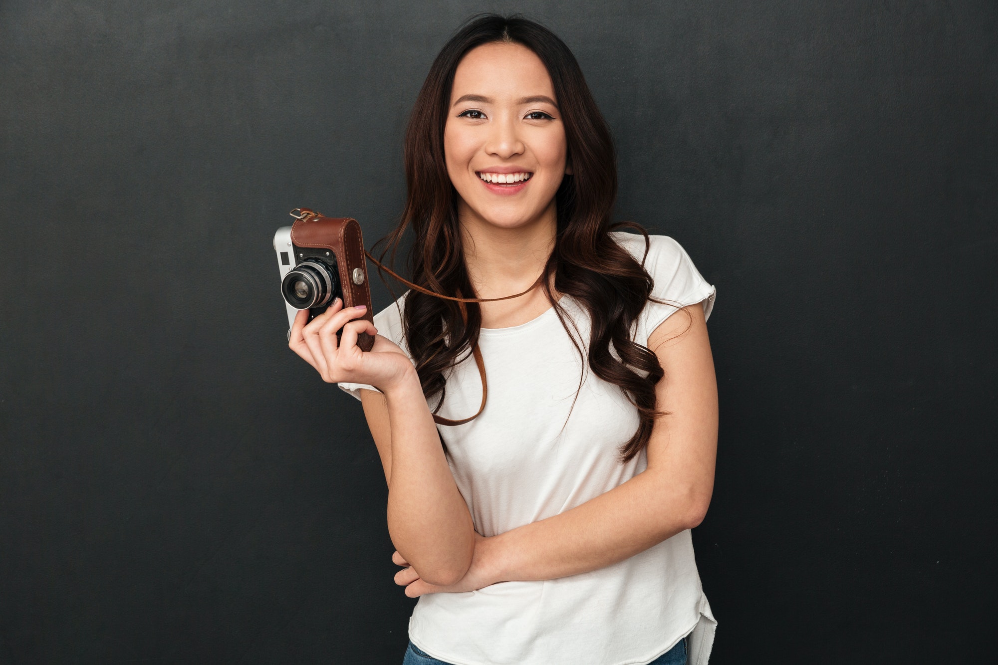 cute asian young woman photographer